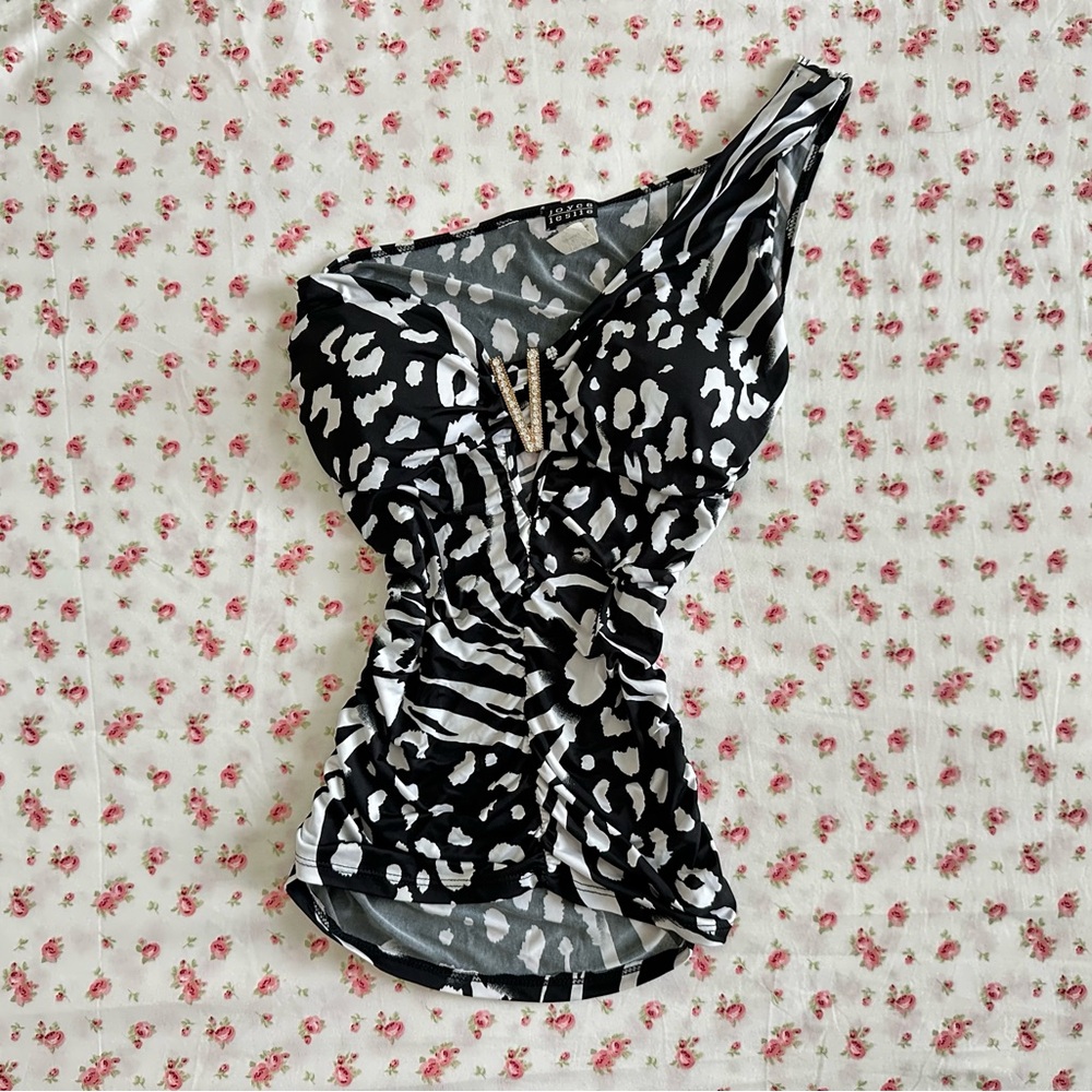 zebra print top with a ruched front and a flattering fit